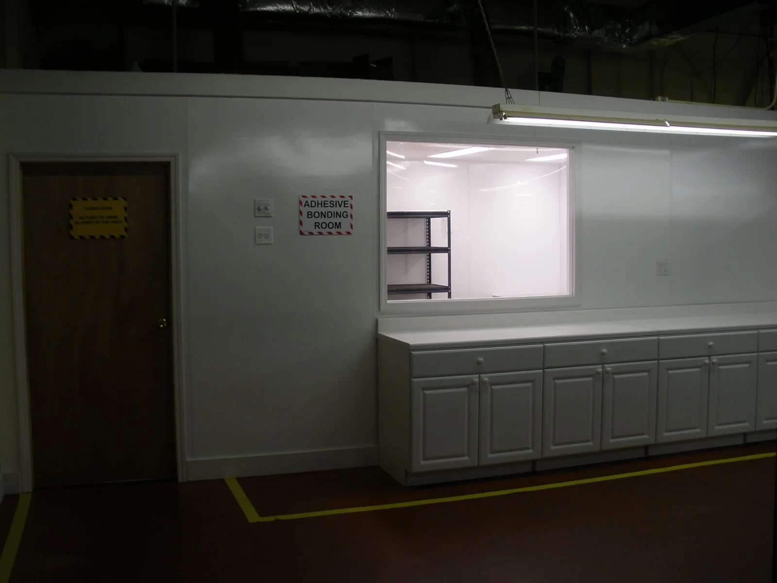 TEK Precision Sikorsky-certified structural adhesive bonding room
